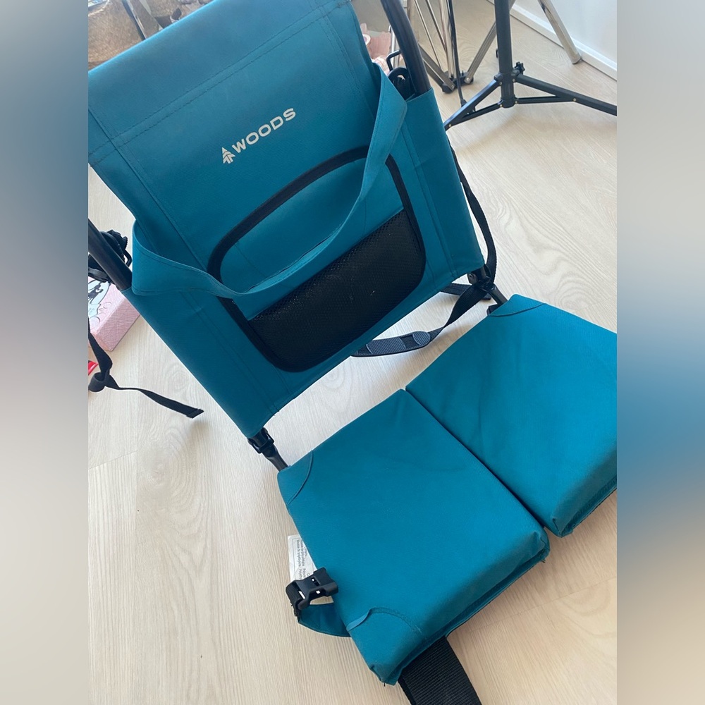 Compact folding stadium/canoe comfort seat, has backpack straps from Can Tire